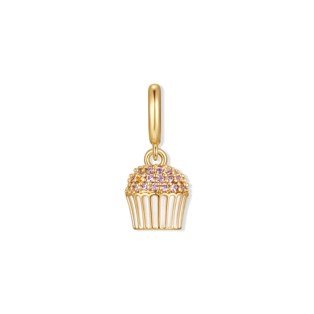 Gold-tone cupcake charm with pink pavé stones on the domed top and a white enamel ribbed base, with a hinged ring clasp.