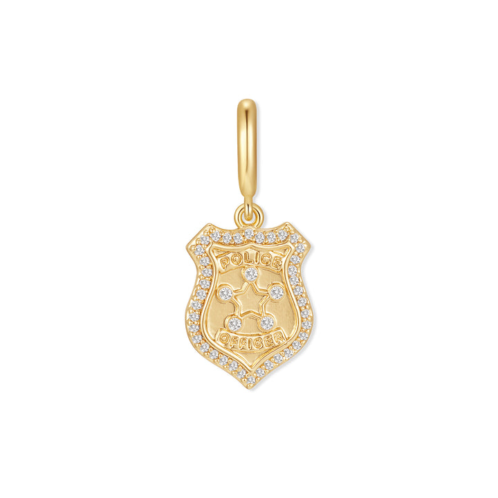 Gold-tone police badge charm with a diamond-pavé border, engraved star and "Police Officer" text, suspended from a ring clasp.