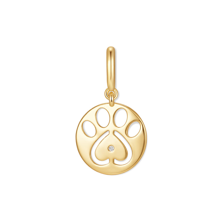 Gold-tone round charm with a cutout paw print design, heart-shaped pad detail, and a single diamond accent at center.