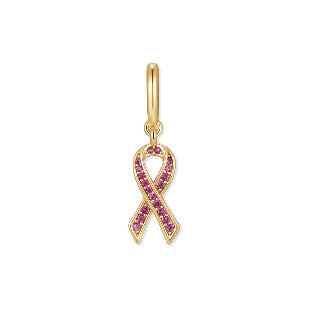 Gold-tone awareness ribbon charm pavé-set with pink stones, suspended from a polished ring clasp.