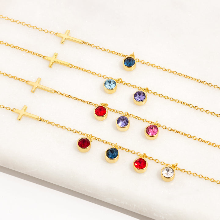 Three Stone Bezel Set Gold Cross Birthstone Necklace